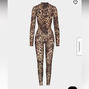 Dolce&Gabbana X SKIMS
Milky Sheer Turtleneck Catsuit